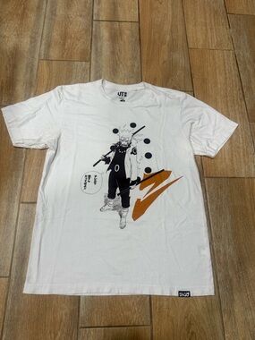 Uniqlo White Naruto Graphic Tee with Orange Accent
